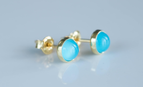 Złocone sztyfty z niebieskim agatem